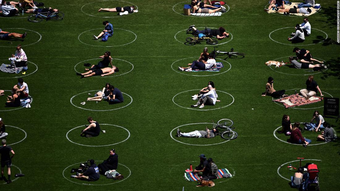 People practice social distancing in New York&#39;s Domino Park on May 17.